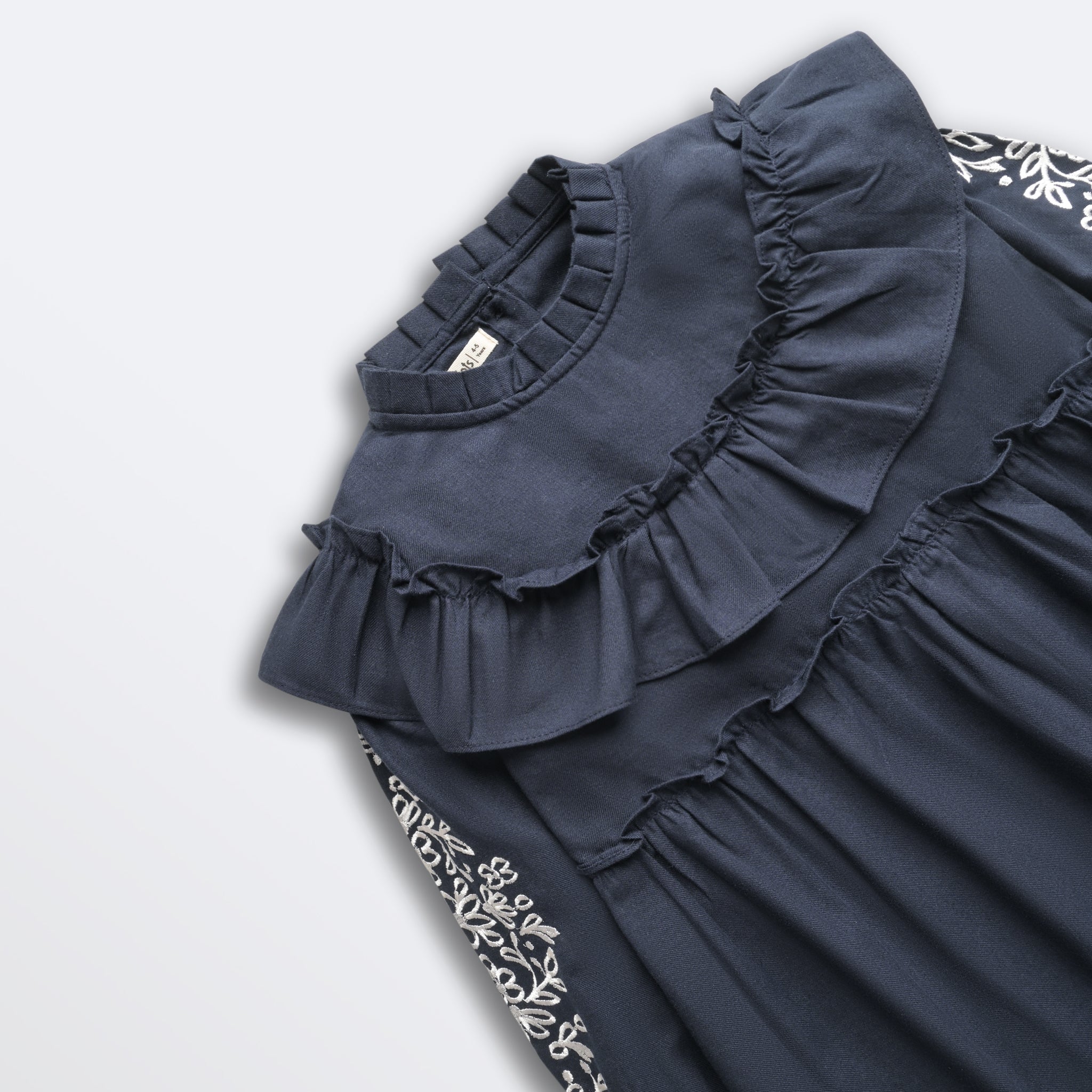 Navy blue dress with ruffled details and floral embroidery 